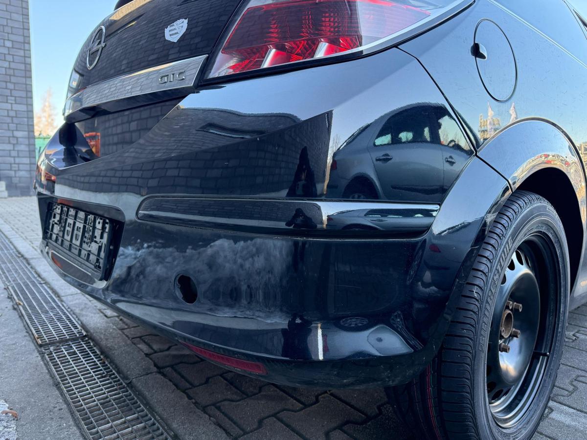 Opel Astra H GTC original Sto&szlig;stange Sto&szlig;f&auml;nger hinten Z20R Saphirschwarz BJ09